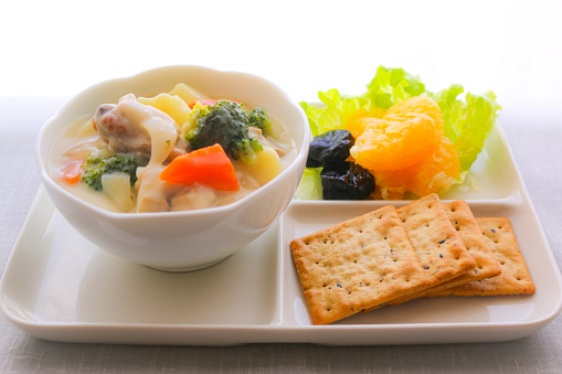 A healthy diet with cereal crackers and vegetable-rich stews and prunes