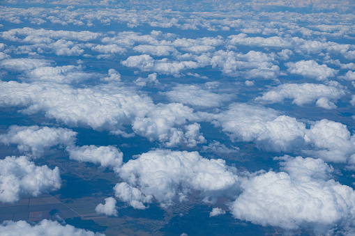 The clouds out of an airplane window look like cotton on route from Istanbul to Saint-Petersburg on Monday, Aug. 10, 2020.