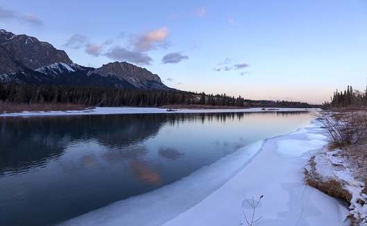 Early Evening Landscape of Bow River and Distant Mount John Laurie or Mount Yamnuska in Alberta Foothills of Canadian Rockies