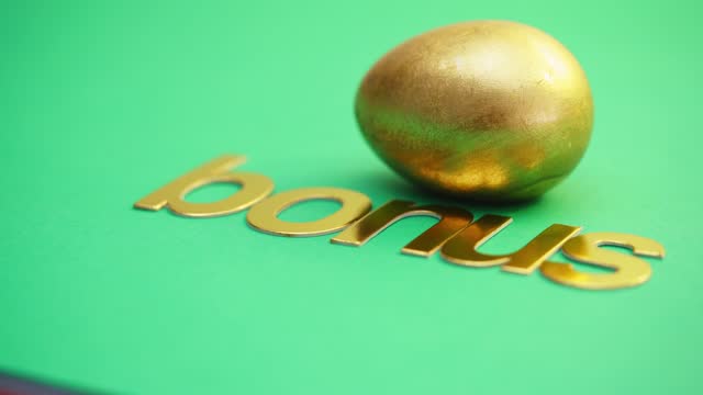 single word bonus and an golden egg on the green background