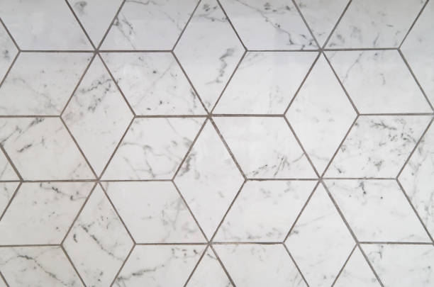 istock Geometric ornament of rectangles in white marble. 1299544014