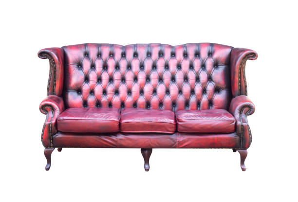 istock Vintage red with black sofa isolated on a white background 1299545206