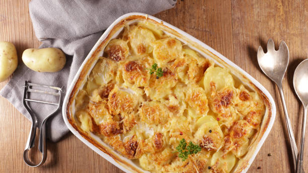 istock baked potato with cream and cheese- gratin dauphinois 1299546058