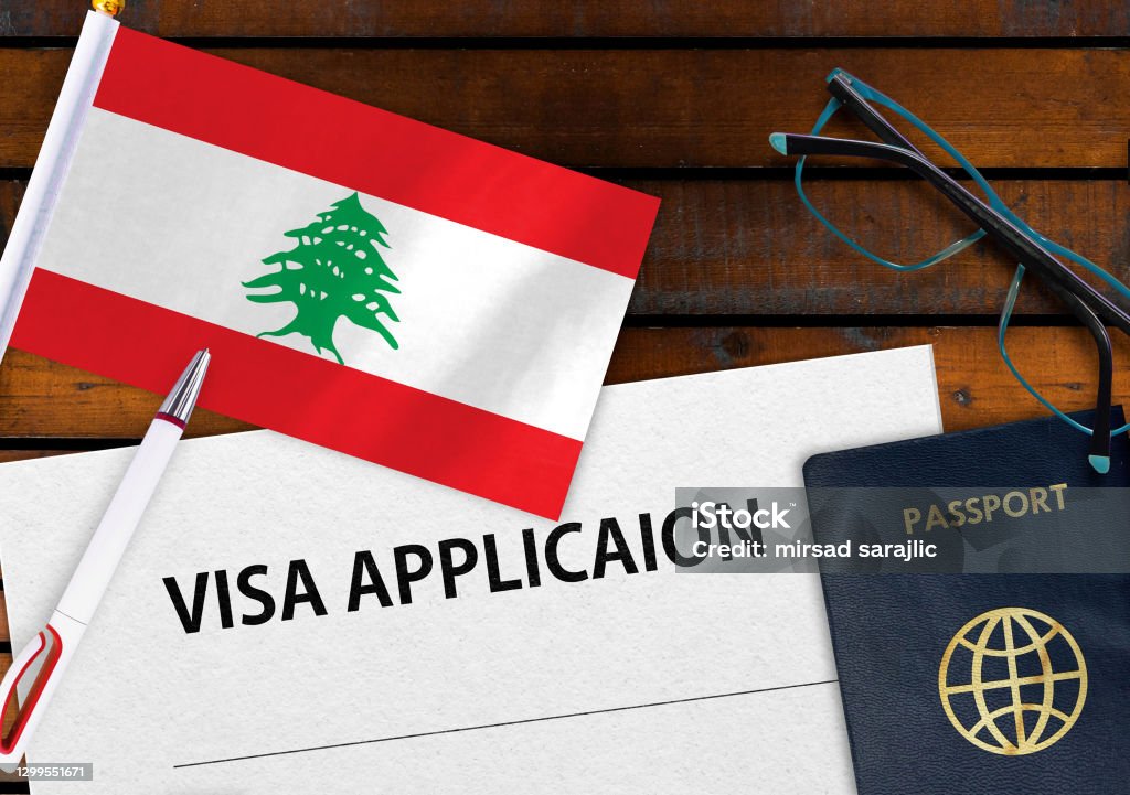 Flag Of Lebanon Visa Application Form And Passport On Table Stock Photo Download Image Now flag-of-lebanon-visa-application-form-and-passport-on-table-stock-photo-download-image-now