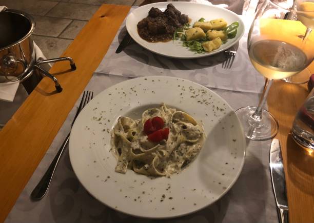 istock Pasta noodles with truffle cream 1299555841