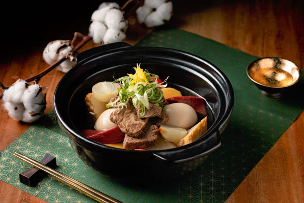 Delicious beef and vegetables Japanese dish Delicious beef and vegetables Japanese dish served in a black cocotte chinese food photos stock pictures, royalty-free photos & images