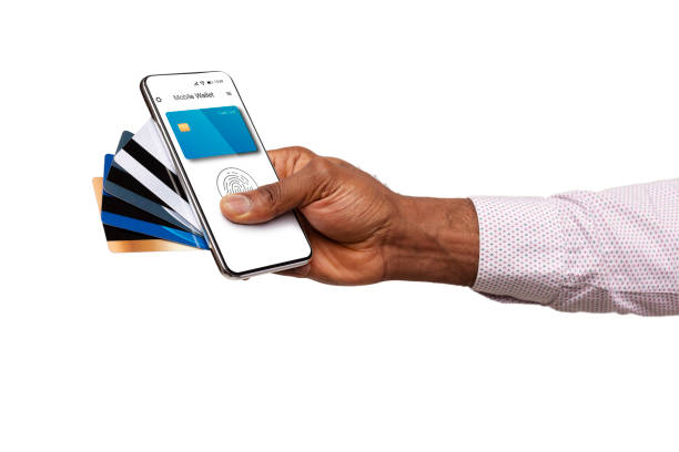 istock Hand Holding Smartphone With Payment Application And Cards, White Background 1299557321