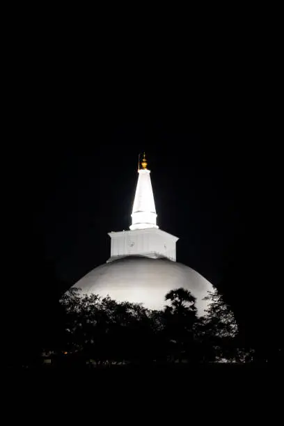 Photo of The Ruwanwelisaya glowing in the night,