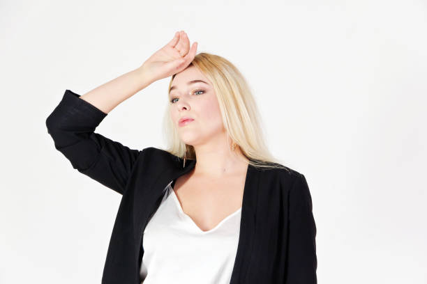 istock Blonde girl portrait isolated on white background. 1299561841