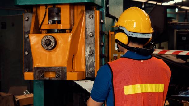 istock Skillful factory worker or engineer do machine job in manufacturing workshop 1299567206