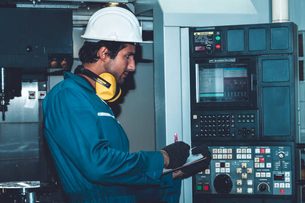 istock Smart factory worker or engineer do machine job in manufacturing workshop 1299568154