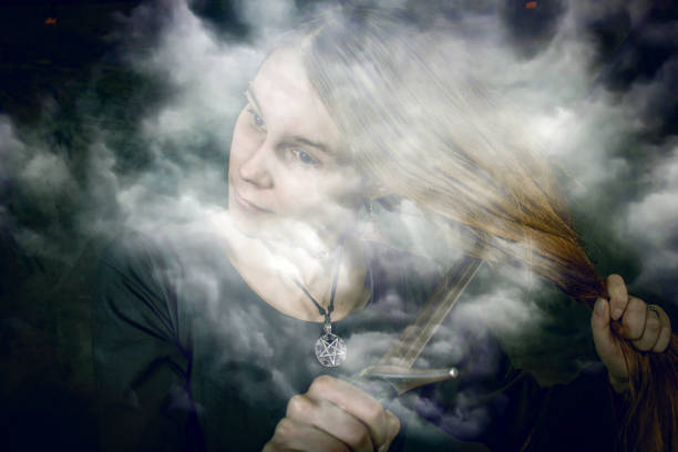 istock Woman with sword in fog 1299568306