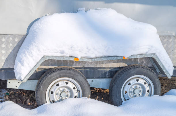 istock Car Tires on a snow-covered winter road. 1299575884