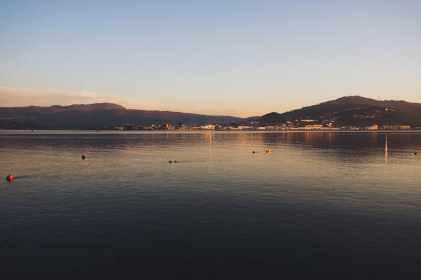 istock Old pier at sunset in a summer day 1299577016