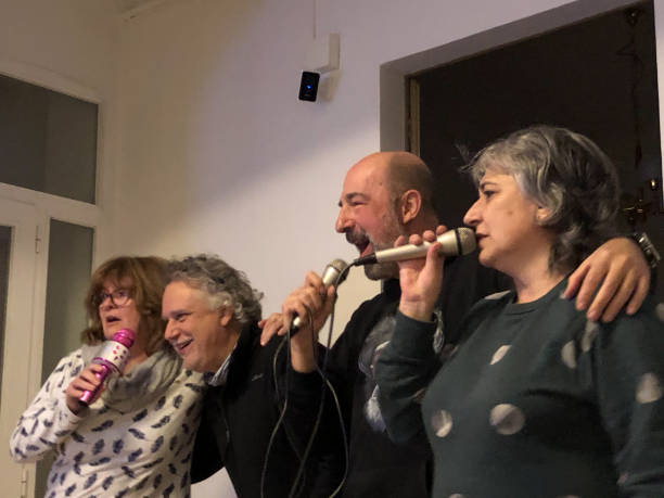 istock karaoke with people mature 1299579671