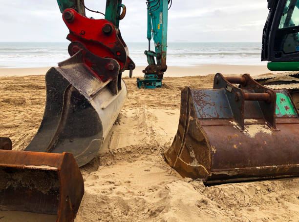 istock Digger landscape in winter beach scene, Dorset , England 1299580731
