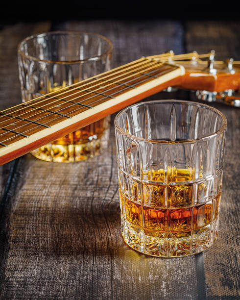 istock still life with whiskey and acoustic guitar 1299580952