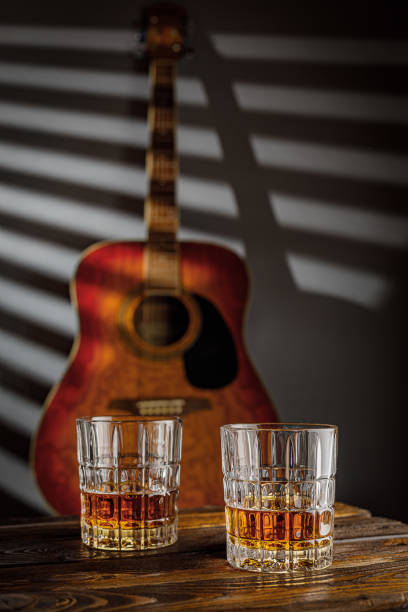 istock still life with whiskey and acoustic guitar 1299581036