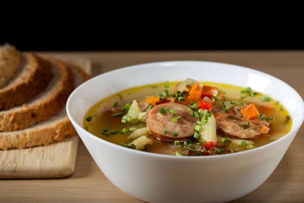 Soup with sausage, vegetables and pasta stock photo