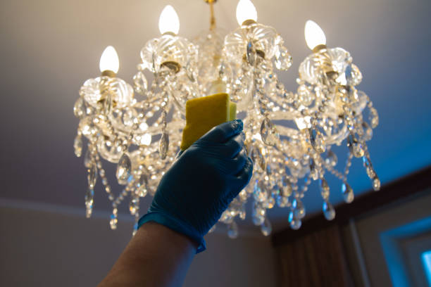 istock Cleaning with a sponge in a blue rubber glove 1299593751