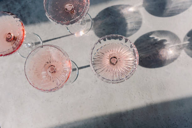 istock Glasses on champagne near ice cubes 1299594003