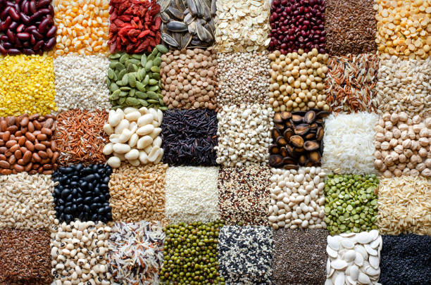Variety kinds of natural cereal and grain seed product in chessboard pattern and dark tone, for healthy food raw material or agricultural product concept Variety kinds of natural cereal and grain seed product in chessboard pattern and dark tone, for healthy food raw material or agricultural product concept red mung bean stock pictures, royalty-free photos & images