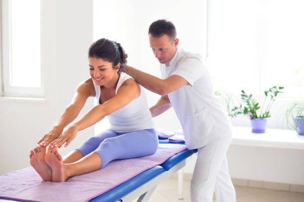 istock Young woman on physical therapy 1299595317