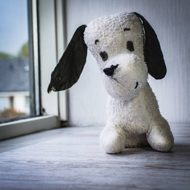 istock Lockdown, a forgotten sick dog sits alone at home. 1299595448