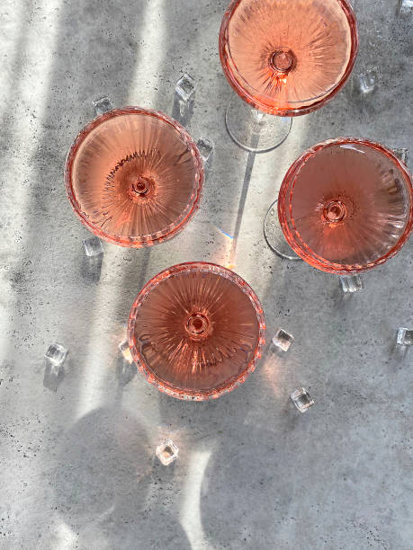 istock Glasses on champagne near ice cubes 1299595569