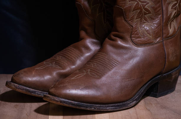 istock Macro shot of brown cowboy boots 1299596252