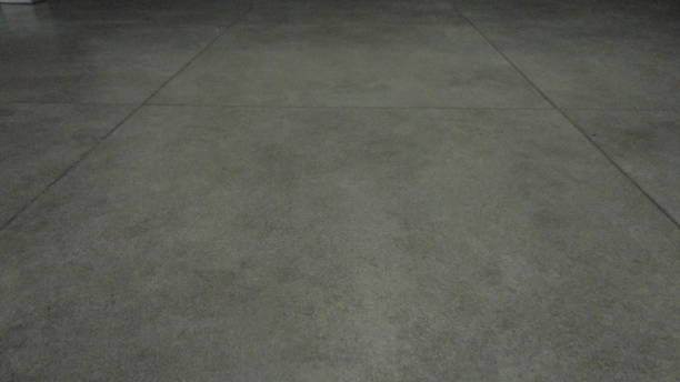 istock Grey colorful grunge stone office floor. 1299597352