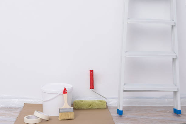 istock indoor wall painting equipment and stairs 1299597631