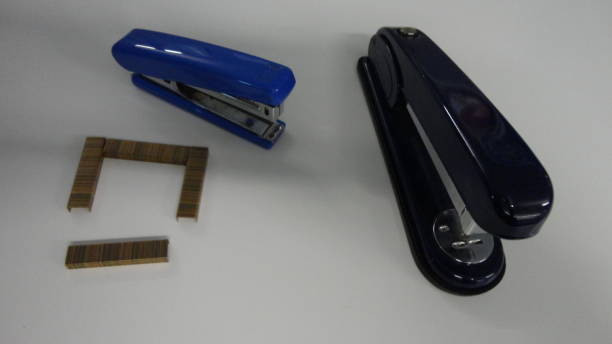 istock Metal staples for stapler isolated on the white office table. 1299598603