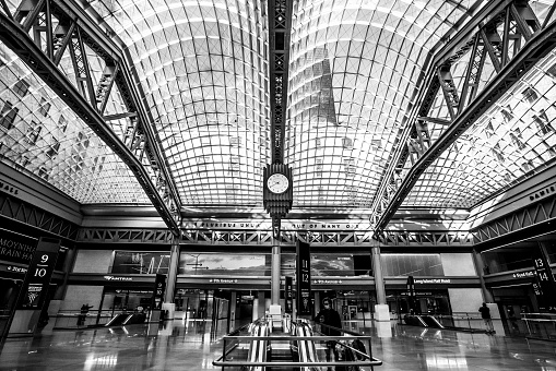 New York City, New York, USA - January 23, 2020: Interior view of the new Moynihan Train Hall at Penn Station in Midtown Manhattan.  This new train hall now acts as a station for the Long Island Railroad and Amtrak train lines.