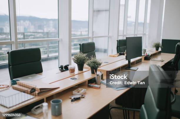 Interior Of Co Sharing Office Lot In Day Time Stock Photo - Download Image Now - Office, Desk, Sharing
