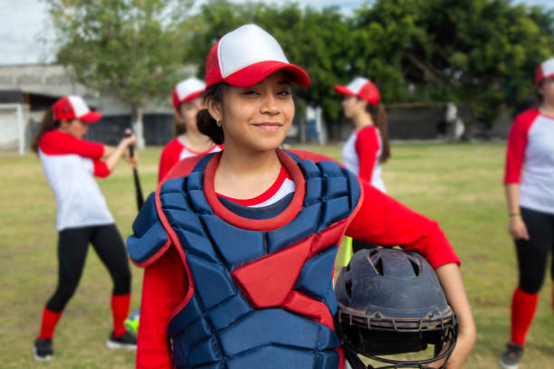 istock Teenage woman baseball player 1299604613