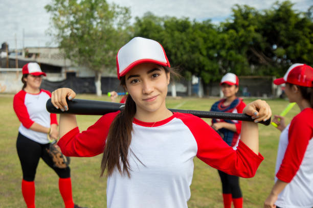 Batting baseball girls