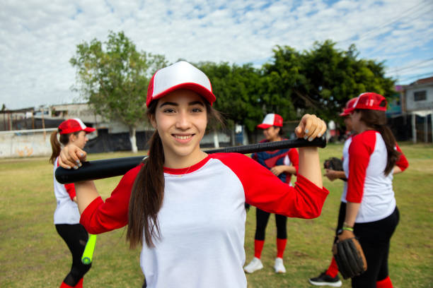 istock Teenage woman baseball player 1299604664