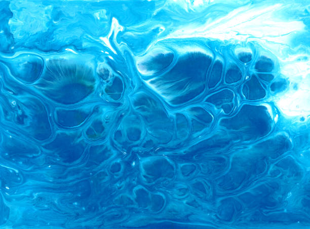 istock Abstract fluid art background. Blue, cyan and white colors mix together. Beautiful creative print. Abstract art hand paint. Original artwork. Color splashing on paper. Cosmic texture 1299605434