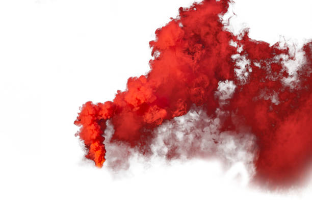 istock Red and orange smoke isolated on white background 1299606643