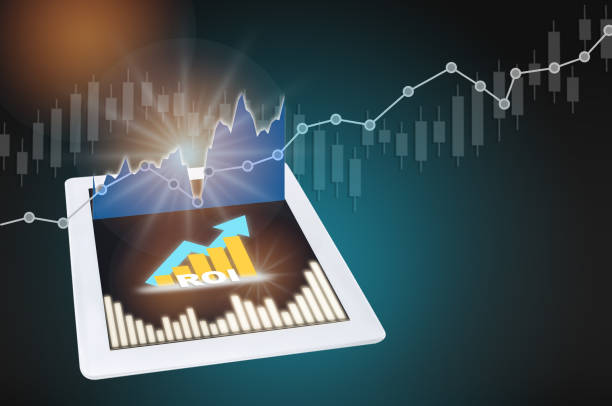 istock ROI word and arrow with chart on computer tablet on finance technology profit success background 1299607322