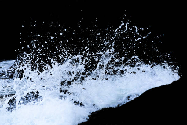 istock Water Splash Isolated On The Black background 1299609504
