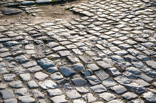 Sunshine on backstreet cobble stones