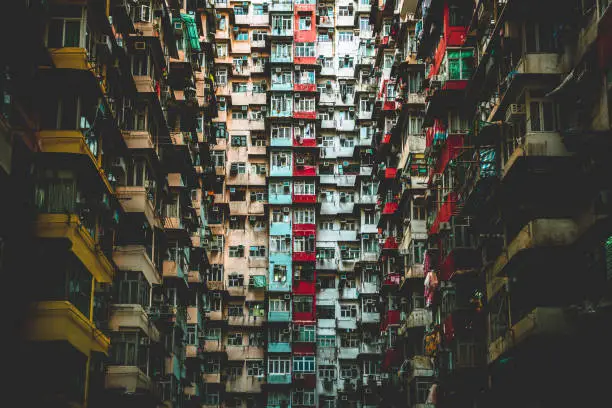 Photo of Facade of Monster building in Hong Kong, Quarry Bay during sunset.