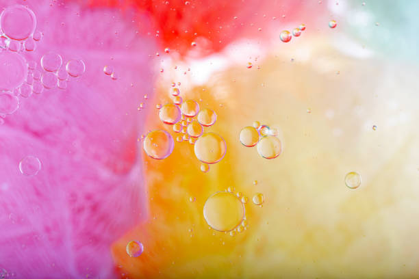 istock Oil drops on a water surface. Abstract and background. 1299614584
