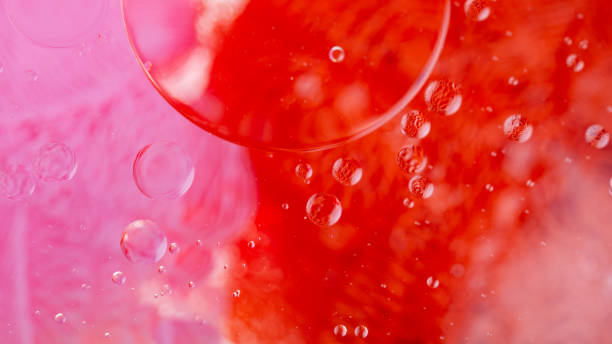 istock Oil drops on a water surface. Abstract and background. 1299616184