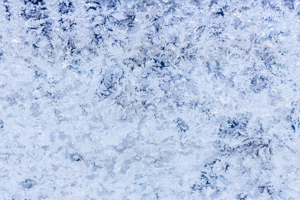 istock Gorgeous view through frozen window. Beautiful winter background texture. 1299616992