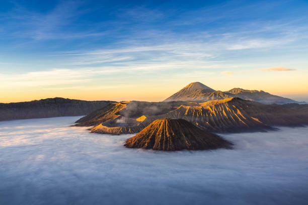 istock Bromo volcano mountaion at sunrise in East Java, Indonesia surrounded by morning fog. 1299619465
