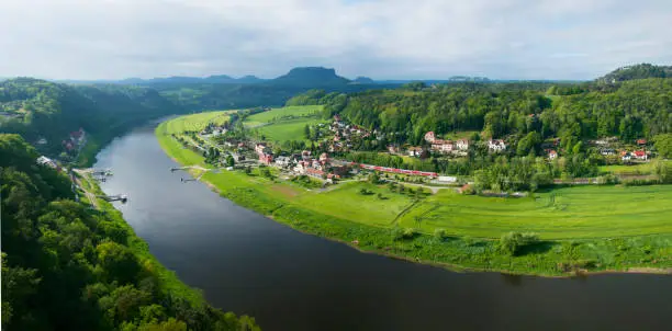 Rathen is a village in the Elbe Sandstone Mountains, in Saxony, Germany, about 35 km southeast of Dresden on the Elbe River.