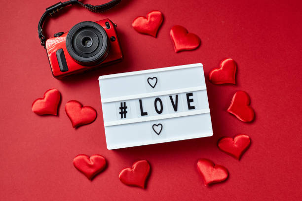 istock Love lightbox message with red hearts on red background 1299621694